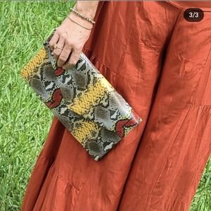 Snake print clutch